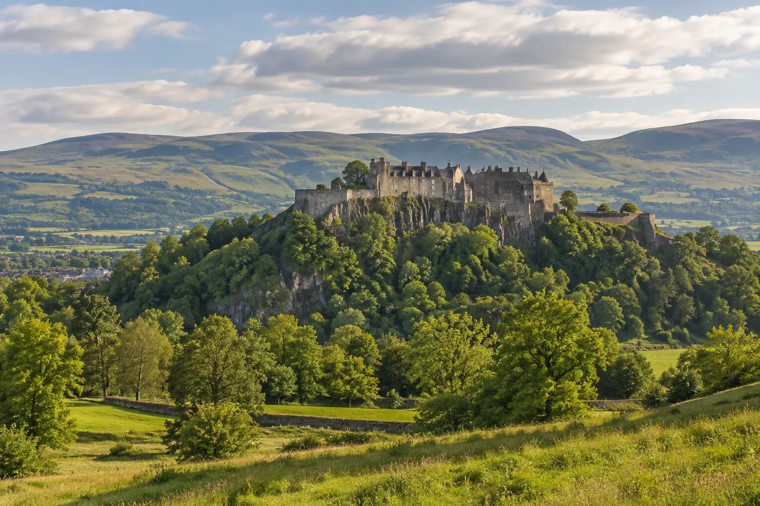 Stirling Castle above the green countryside of central Scotland